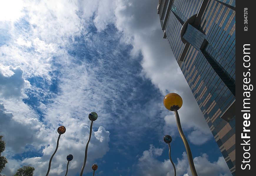 Public plaza before a modern skyscraper in a city's business district