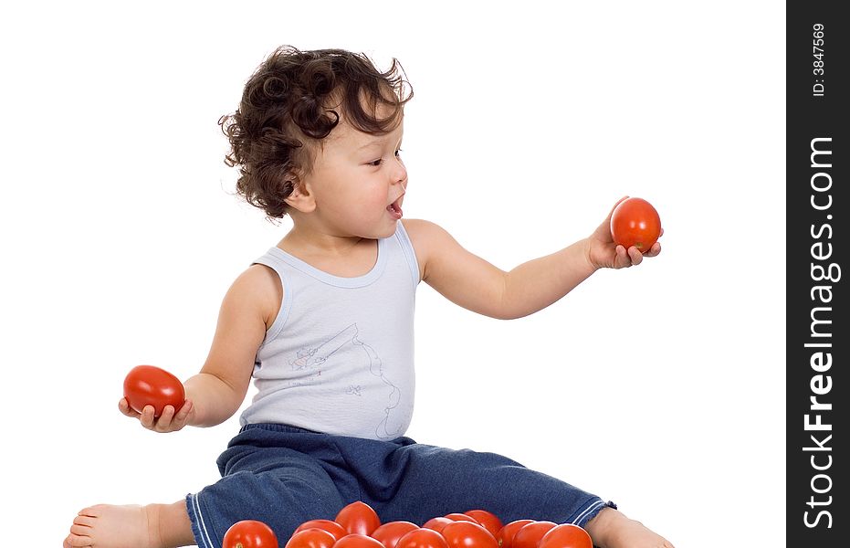 Child with tomato,isolated on a white background. Child with tomato,isolated on a white background.