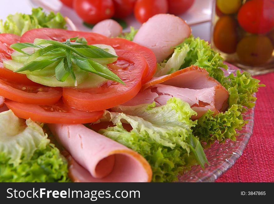 Fresh salad with onion, tomato, basil and cucumber. Fresh salad with onion, tomato, basil and cucumber