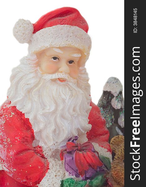 Portrait of toy Santa Claus over white background