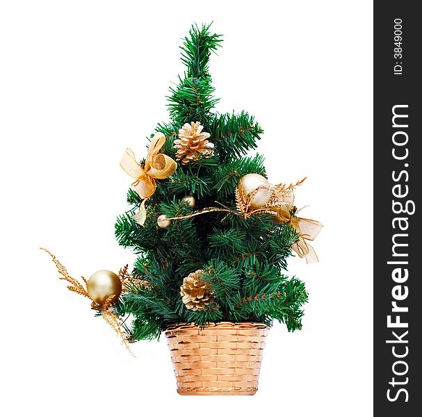 Artificial christmas fur-tree in плетеной to a basket on a white background