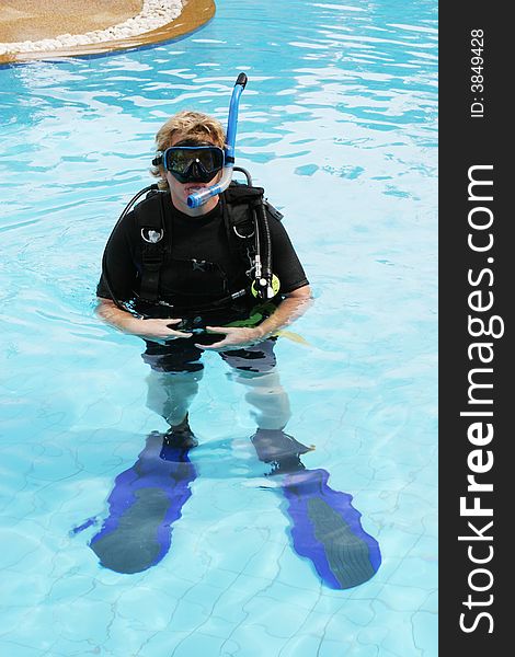 Scuba diver in the swimming pool.