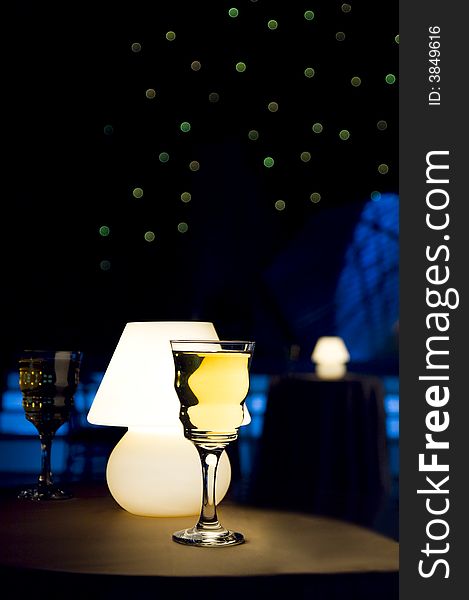 Romantic evening in restaurant with white wine and lamp. Romantic evening in restaurant with white wine and lamp