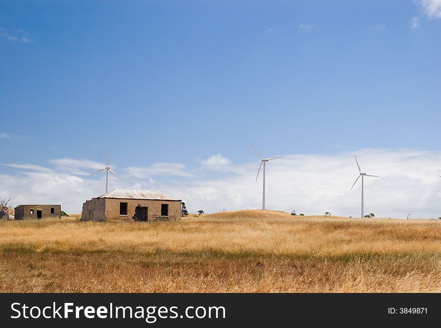 Forgotten Farmhouse And New Wind Turbines