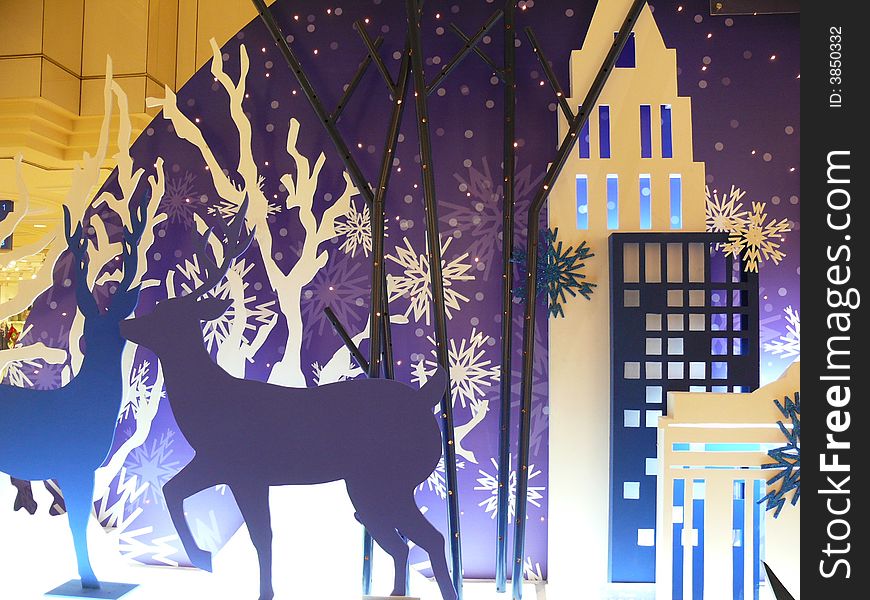 Reindeer and snowflakes in the city. Reindeer and snowflakes in the city