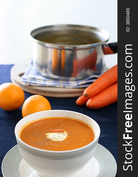 Carrot and orange soup with a dollop of creamy yogurt and sprinkle of thyme