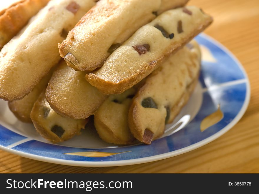 Tasty fruit cakes on a plate