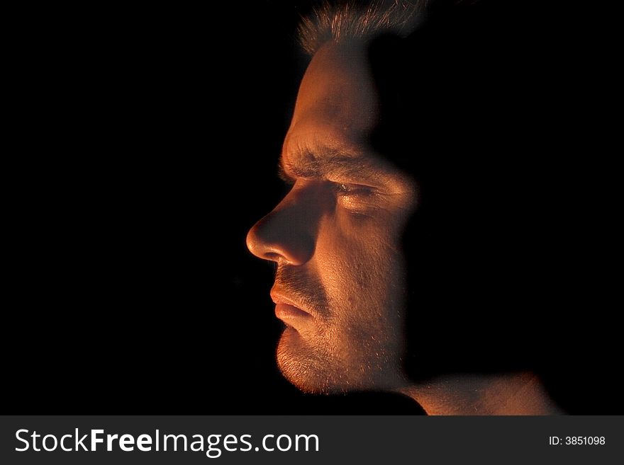 Face of man in the dark night
