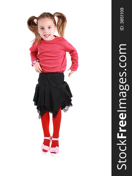 Young girl in red on the white background