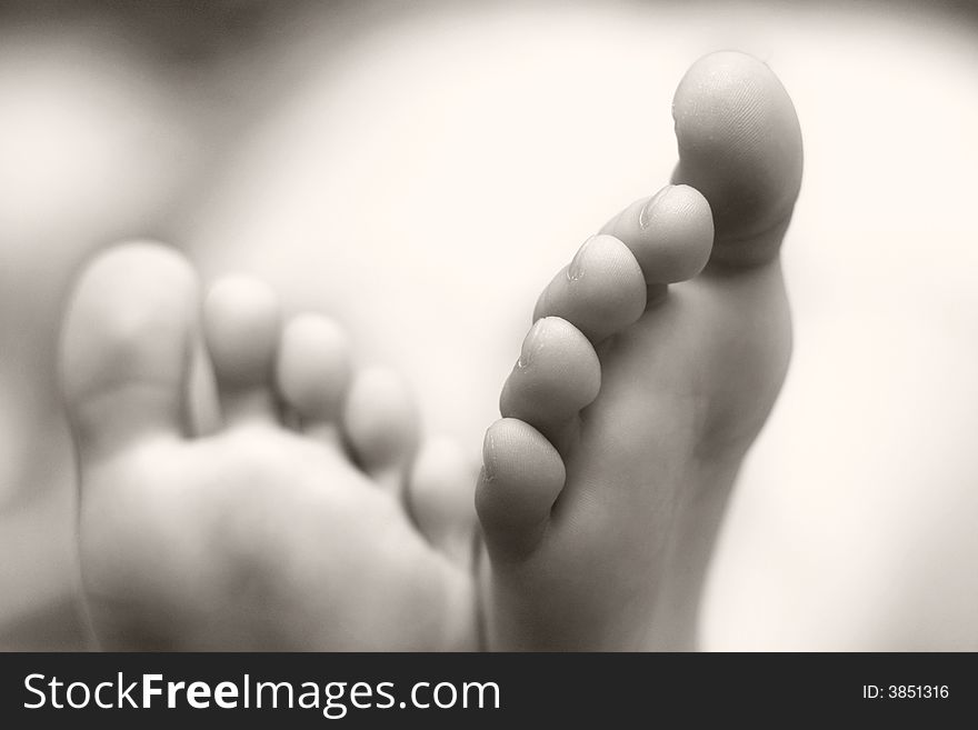 An image of little foots of sleeping baby