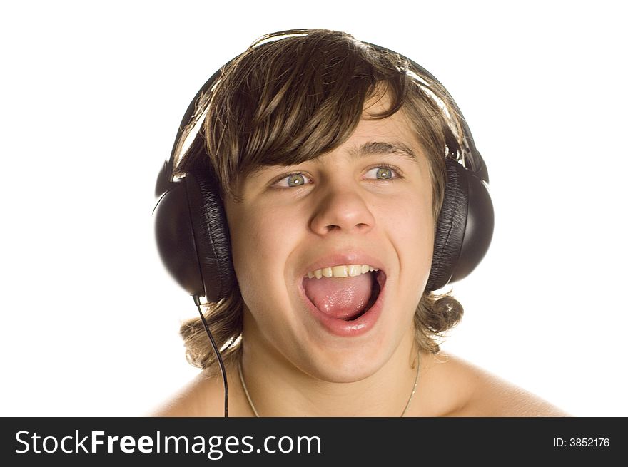 The teenager in ear-phones emotionally listens to something