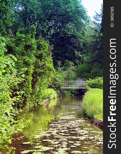 French garden of Essonne, bridge and river. French garden of Essonne, bridge and river.