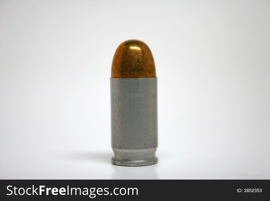 Handgun Bullet close up with a white background