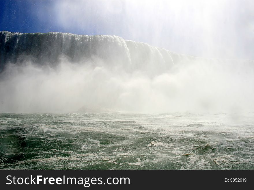 River level dramatic view of Canada's majestic Horseshoe Falls at Niagara. River level dramatic view of Canada's majestic Horseshoe Falls at Niagara.