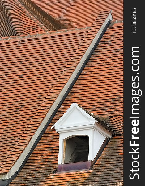 Roof with tiles and window of the monastery of Herzogenburg. Roof with tiles and window of the monastery of Herzogenburg