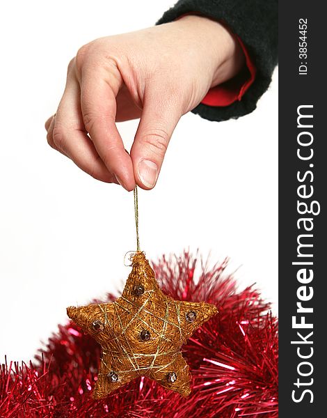 Festive star in hand, christmas ornament