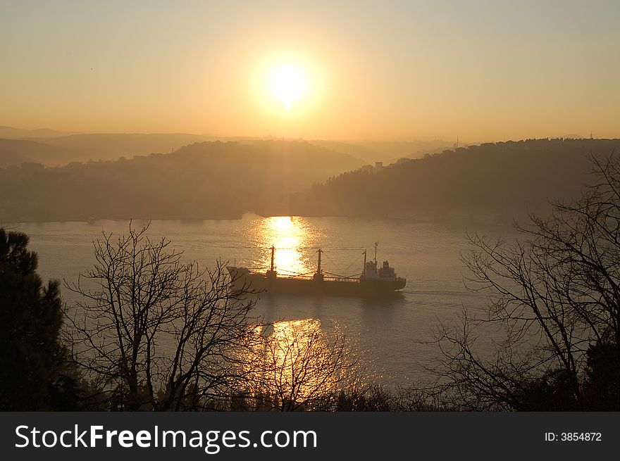 Ship On Bosphorus At Sunrise