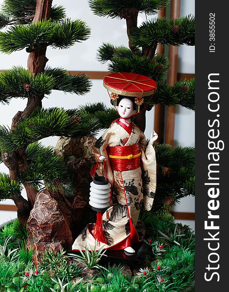 Japanese geisha doll on the white  background