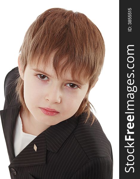 Close-up of boy in business suit. Shot in studio. Close-up of boy in business suit. Shot in studio.