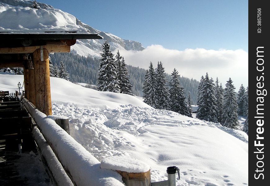 Looking onto snowy mountains from a terrace, in the northeastern part of Switzerland. Looking onto snowy mountains from a terrace, in the northeastern part of Switzerland.