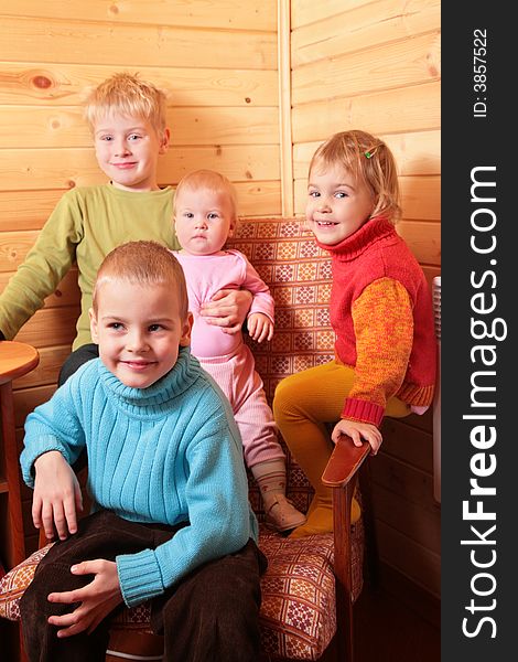 Smiling children in wood house