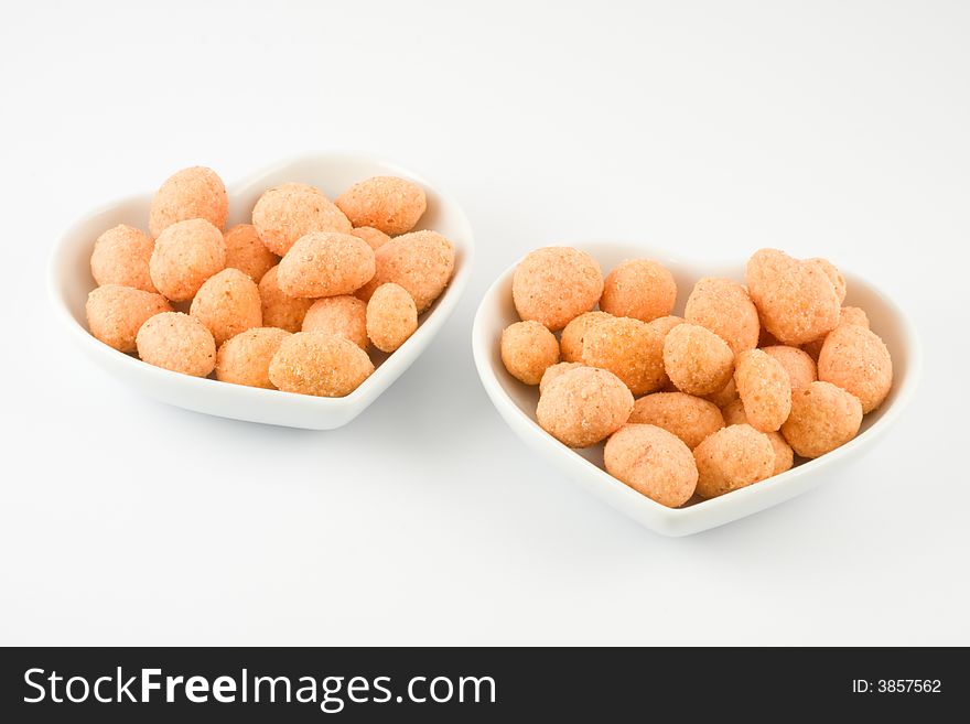 Nuts in hearts isolated on a white background