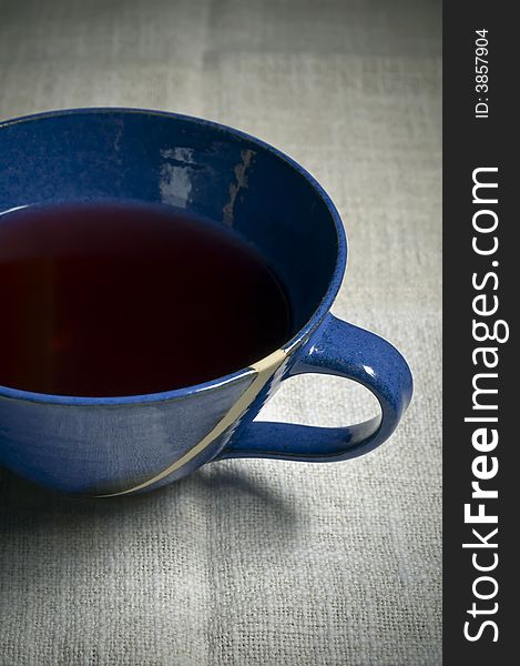 Tea cup with red herbal tea. Tea cup with red herbal tea