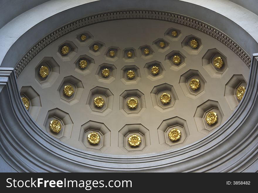 Architectural details - golden decoration inside half dome