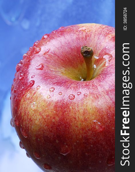 Water drops on red apple