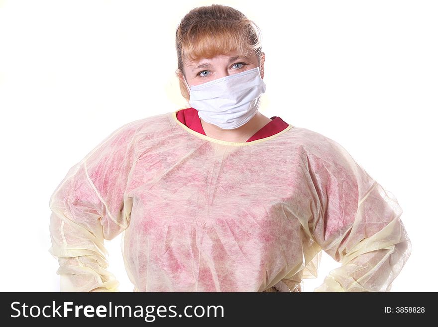 Nurse with blue eyes with face mask. Its flu season. Nurse with blue eyes with face mask. Its flu season.