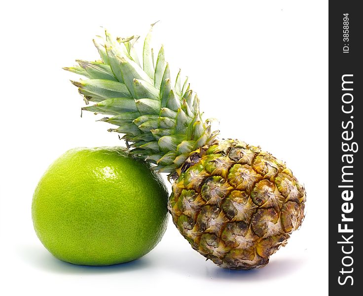 Pineapple and pomelo isolated on white background