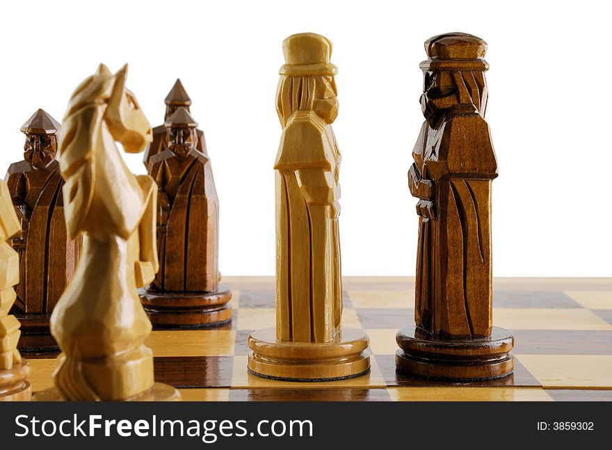 Opposition two chess king. The placed party from chessmen. Figures - from a tree, manual work