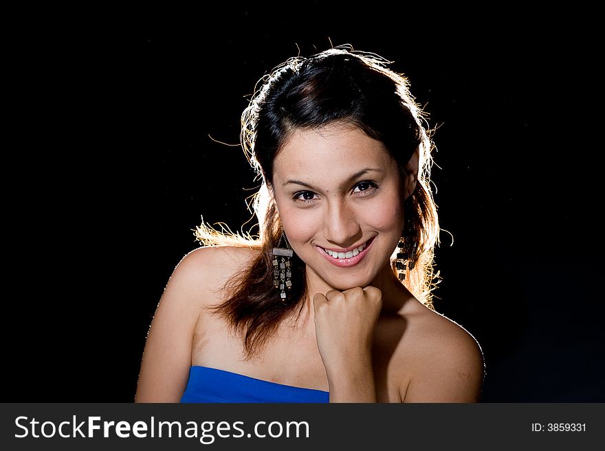 Smiling glowing girl on black background. Smiling glowing girl on black background