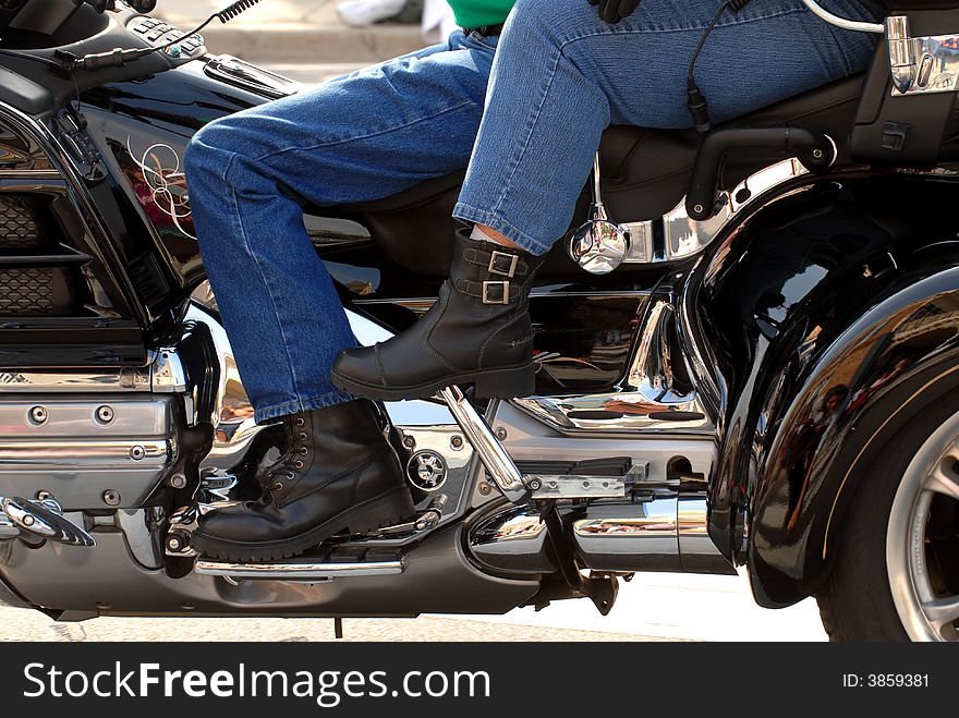 Side view of a motorcycle with two riders