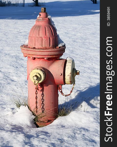 A fire hydrant in the winter
