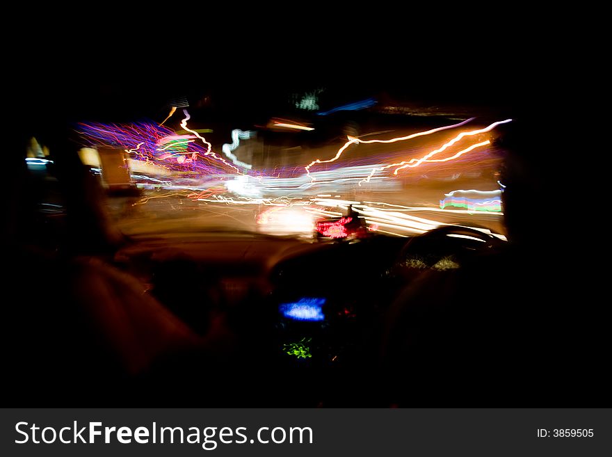 Moving abstract lights from inside a car. Moving abstract lights from inside a car