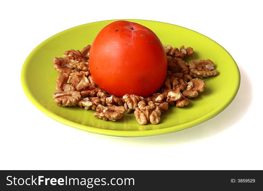 Circassian Walnuts And Persimmon On Plate