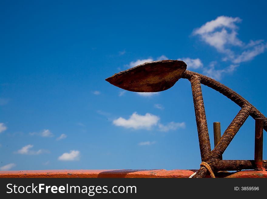 Sea anchor in front of blue sky. Sea anchor in front of blue sky