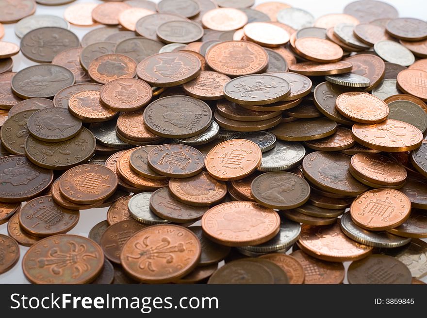 Pile of yellow and silver coins, penny. Pile of yellow and silver coins, penny