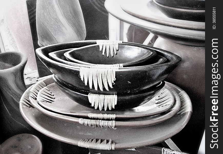 Black and white photo of indonesian traditional wooden bowl and plates from Lombok island. Black and white photo of indonesian traditional wooden bowl and plates from Lombok island.
