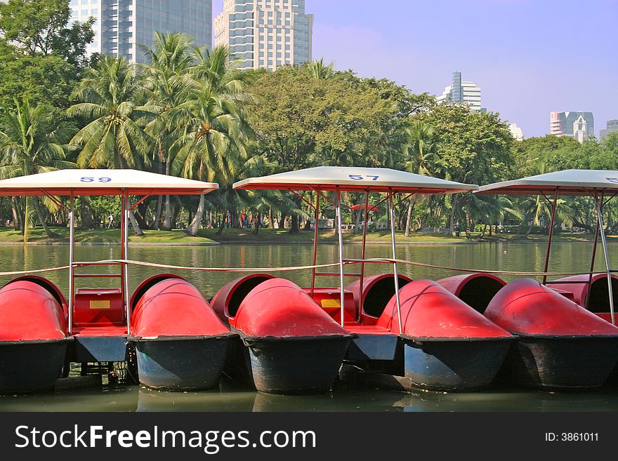 Pleasureboats in Lumpini Park in downtown Bangkok, Thailand. Pleasureboats in Lumpini Park in downtown Bangkok, Thailand