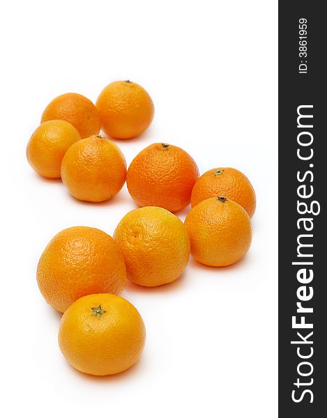 Isolated orange sweet tangerines on a white background. Isolated orange sweet tangerines on a white background
