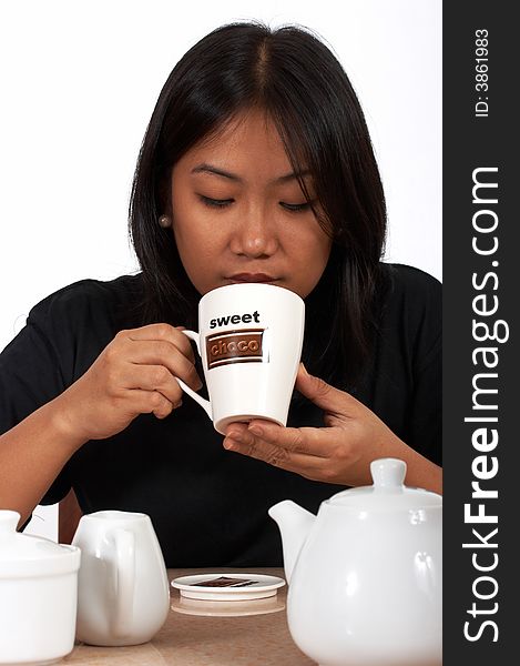 Woman drinking coffee in white mug. Woman drinking coffee in white mug