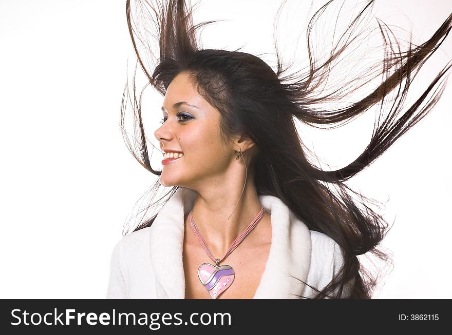 The beautiful brunette with in flying hair