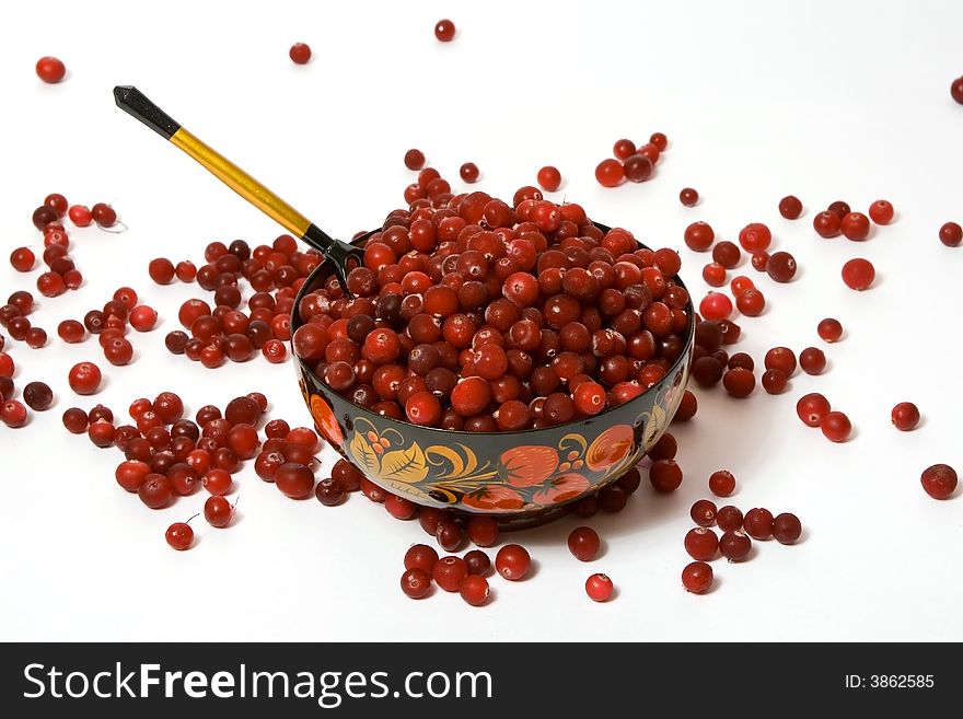 Cranberry in Russian wooden bowl. Cranberry in Russian wooden bowl