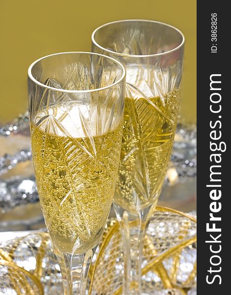 Glasses with champagne on celebration table