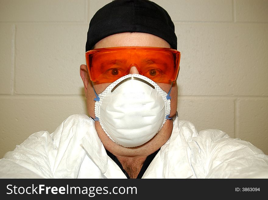 Forensic scientist working on a case in the lab. Forensic scientist working on a case in the lab.