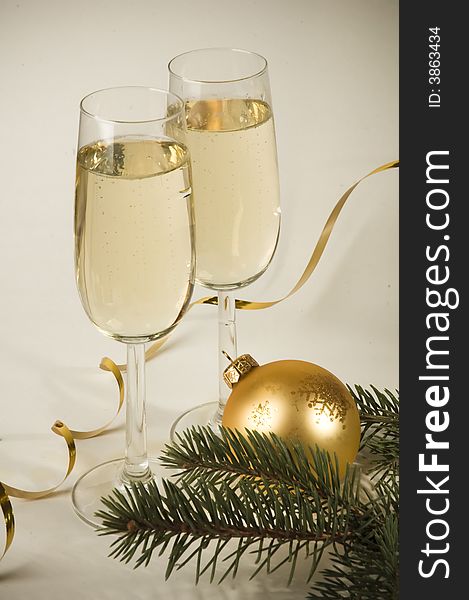 Champagne, cups and fir tree. Champagne, cups and fir tree