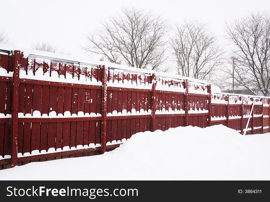 Red Fence In Snow Day