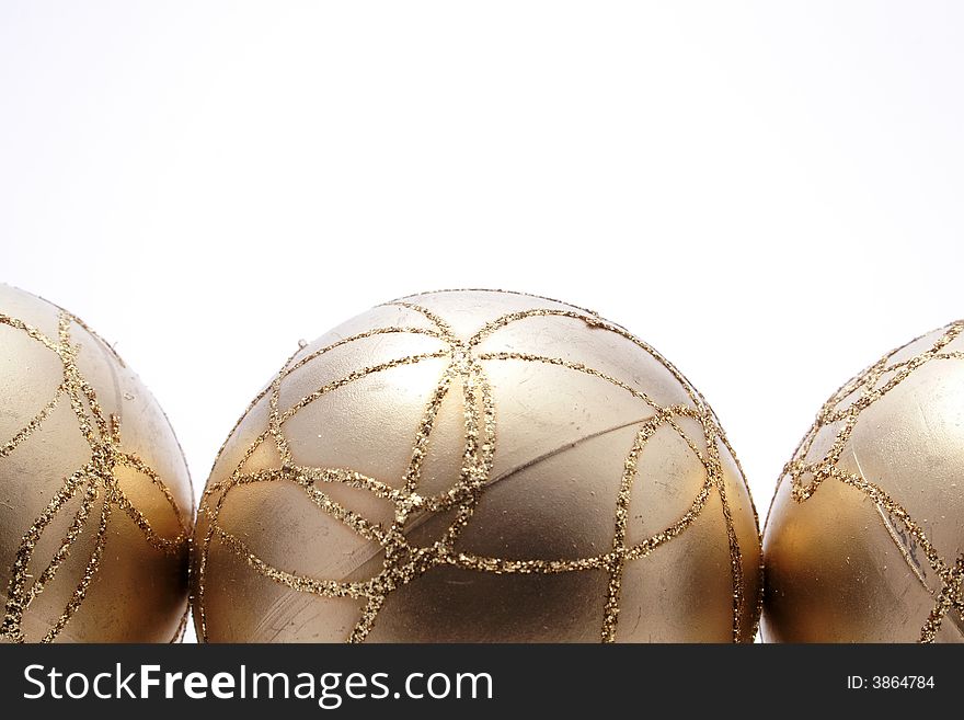 Christmas gold balls,decoration on the white background